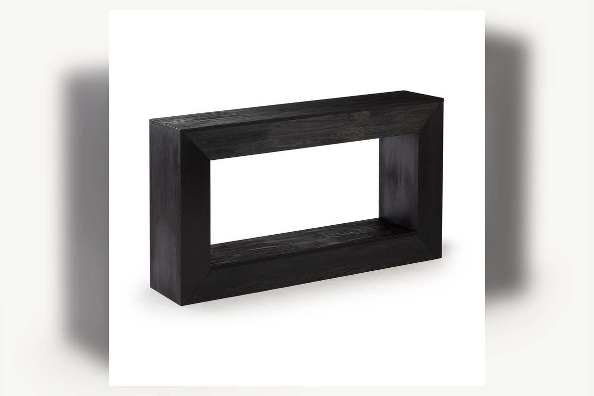 Console table shelf detail showing simple wood storage